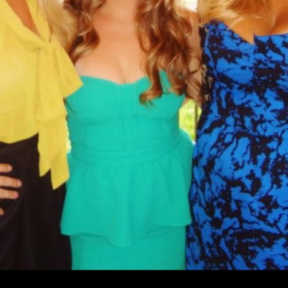 Mini turquoise peplum dress